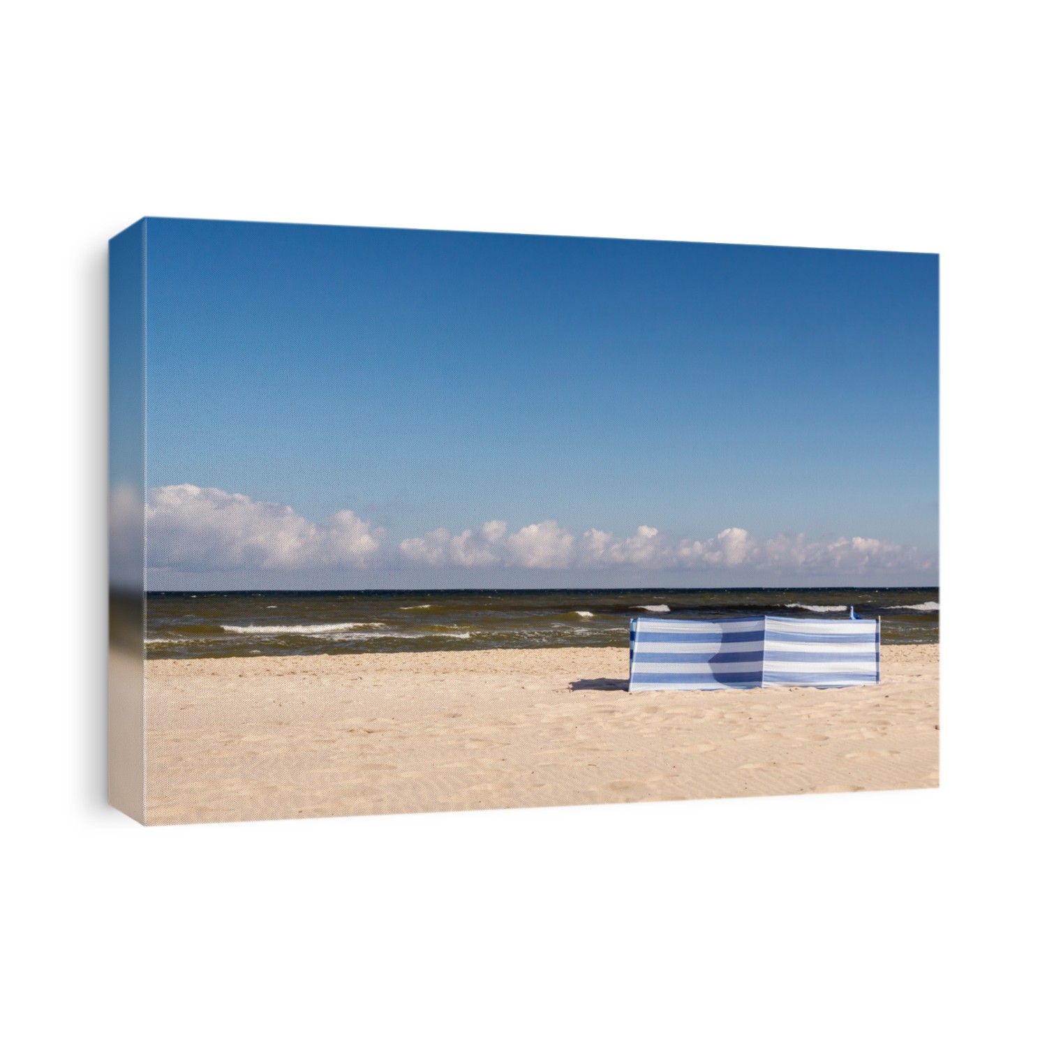 White and blue striped windbreak at the beach